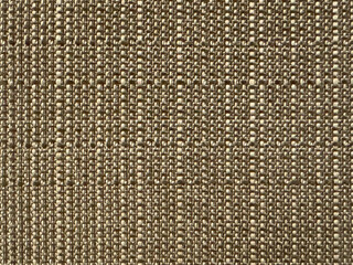 Close up photo of gold synthetic fabric pattern. Gold rattan weaving art seamless background texture.