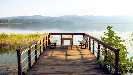 Fototapeta premium Calm lakeside scene with a wooden pier overlooking Sapanca Lake.