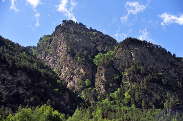 Incredible cliffs rising to the sky create the unique charm of the Baksan Gorge.