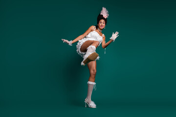 Elegant costume blends classic and modern elements, capturing the fusion of baroque style with...