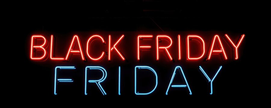 Neon sign advertises Black Friday sale. Bright red, blue neon lights spell out Black Friday on dark background. Commercial message for huge discounts. Festive, modern style. Retail atmosphere. Great