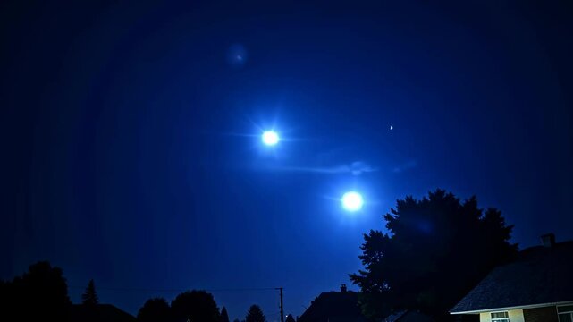 Two Glowing Orbs in the Night Sky: UFO or UAP Sighting? Drone Footage of Mysterious Lights