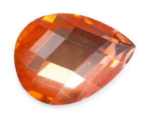 One orange shiny gemstone isolated on white
