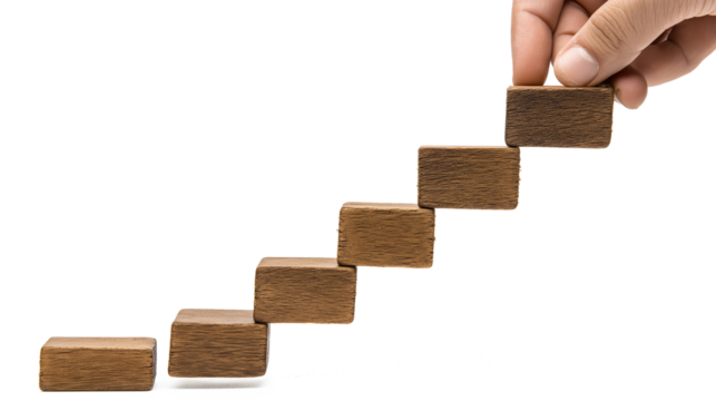 Hand-putting wooden blocks as steps isolated on a white background