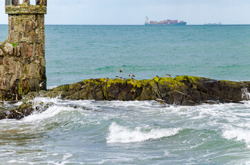 Waves crashing over the rocks at Groomsport Co. Down Northern Ireland