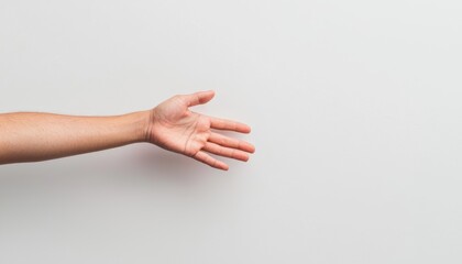 Close-up of reaching human hand isolated on white symbolizing hope, help, or extending trust and support