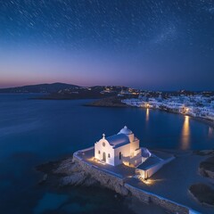 Drone captures Paraportiani and Little Venice at night.