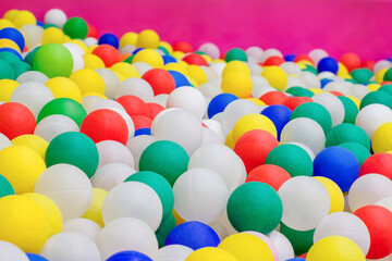 A lot of colorful plastic balls for a festive event.