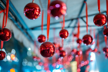 The store decorated with red Christmas tree balls