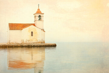 Rustic white chapel with a red roof reflecting on still waters under a soft pastel sky creating a tranquil coastal scene
