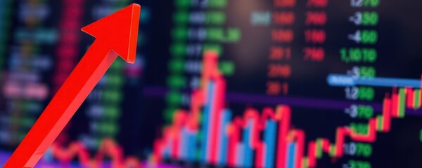 Red upward trend arrow on screen showing financial data. Charts show fluctuating market data. Investment performance depicted through stock market data analysis. Global economic performance in