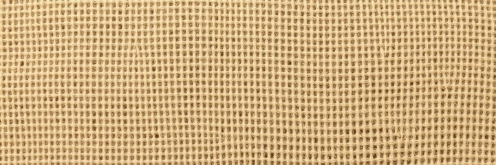 Fototapeta premium Close-up of Hessian fabric, natural color, textured background, hessian,rustic image,cloth image