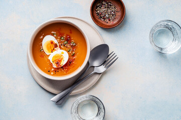 Butternut squash soup  with boiled egg, autumn or winter delicious healthy food