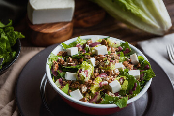 sweet fresh salad with feta cheese. Close up