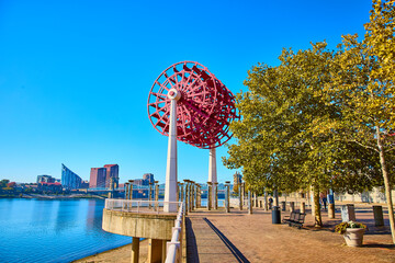 Vibrant Red Paddle Wheel at Cincinnati Riverfront Eye-Level View