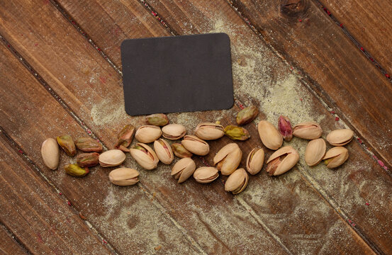 cattering of pistachio nuts with space for text