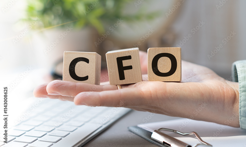 Poster a person is holding a wooden block with the letters cfo on it. the blocks are stacked on top of each