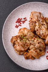 Grilled boneless chicken thigh with salt, spices and herbs