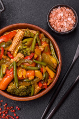 Mix of vegetables corn, carrots, peppers, broccoli, onions in teriyaki sauce