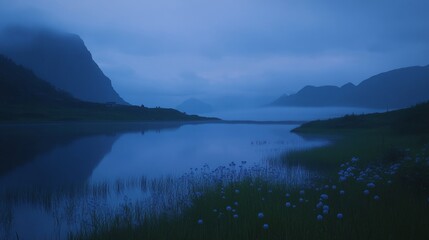 Immerse yourself in the ethereal glow of the Blue Hour, where twilight's soft hues paint the Lofoten landscape in surreal splendor.