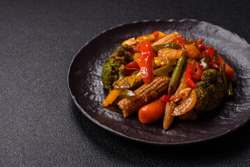 Mix of vegetables corn, carrots, peppers, broccoli, onions in teriyaki sauce