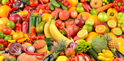 Assorted ripe berries, fruits and vegetables. Food concept background.