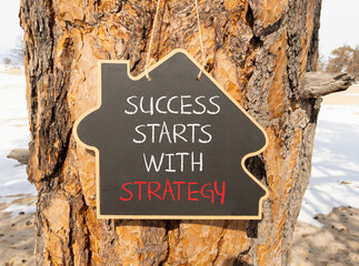 Success starts with strategy symbol. Concept words Success starts with strategy on beautiful...