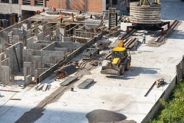 Top view of construction site during concreting of basement stairs