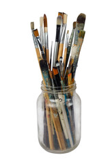 Various professional paint brushes in the glass jar, isolated on white background