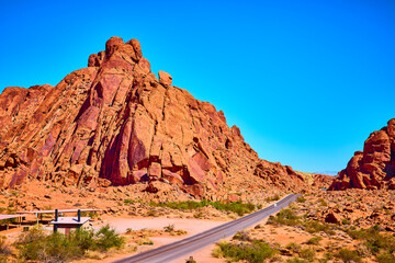 Red Rock Formation and Desert Road in Moapa Valley Eye Level View