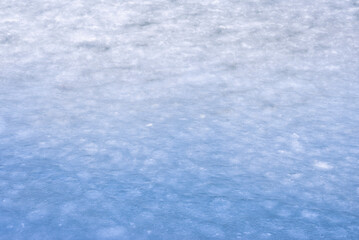 Natural texture of ice, frozen lake  as  background.