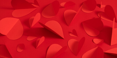 Valentines day background. Stylish red hearts composition on red paper background. Happy...