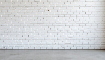 Fototapeta premium Empty room with white brick wall, gray floor. Simple, clean design. Ideal backdrop for product displays interior design inspiration. Rustic style. Suitable for various design purposes. Versatile