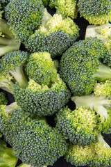 Fresh green raw broccoli background. Top view.