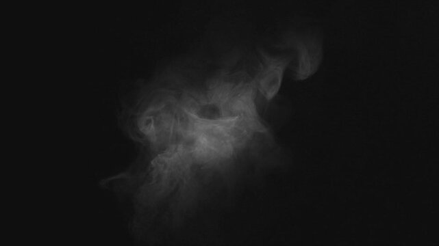 Steam, smoke, vapor isolated on black background. Smoke steam spray, abstract vaporing water, texture of cold mist, hot vapor, fog effect closeup, black screen. Hot food, drink. Overlay using