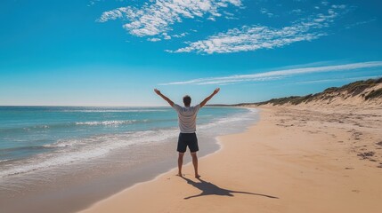 A man stands on the shore with arms raised, embracing the warm sun and the calm ocean waves on a beautiful day at the beach. Generative AI