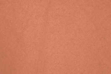 Fototapeta premium Mocha Mousse toned colour monochrome texture knitted fabric. Knitted Jersey as textile background. Monochrome color background. Wool knitting texture. Trendy color 2025.
