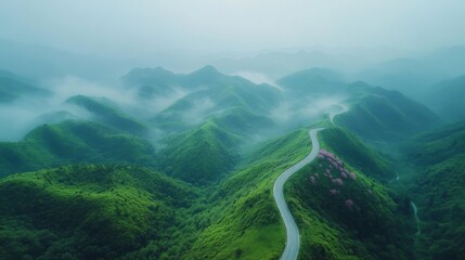 Aerial view of green rolling hills under a cloudy sky