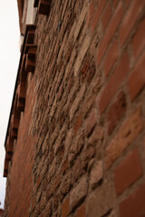 photo Close-Up Perspective of Vintage Brick Wall Showcasing Textured Masonry Patterns and Architectural Design Element in Historical Construction and Structural Engineering