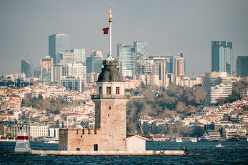 Maiden’s Tower amid Istanbul’s skyline. A timeless blend of historical charm and modern architecture by the Bosphorus.