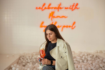 Beautiful girl drinking a cocktail.
