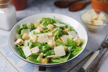 A bowl with classic Caesar salad
