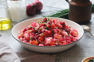 A bowl with Vinegret salad, a typical Russian dish