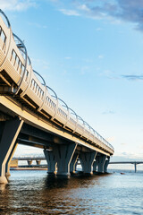 bridge over the water, an expressway against the sky. Transport architecture, engineering...