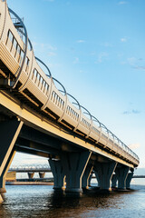 bridge over the water, an expressway against the sky. Transport architecture, engineering...