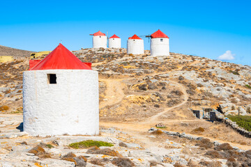 View of windmills near Chora village from trekking trail, Amorgos island, Cyclades, Greece
