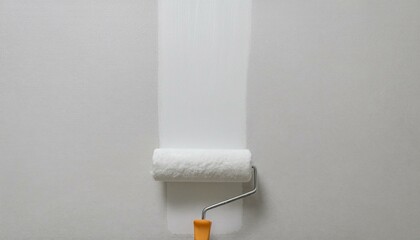 Obraz premium Roller applying paint to wall, scene of smooth rolling on wall