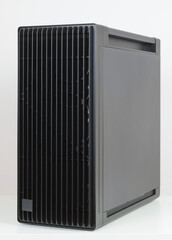 Side view of empty  big tower, PC case, chassis, 15.5 mm front panel grille with 45% porosity for maximum air intake. Studio shoot on white background.