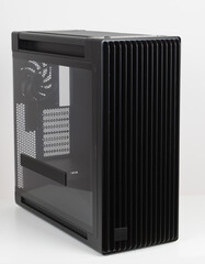 Side view of empty  big tower, PC case, chassis,  tempered-glass left panel has a mesh window to aid in graphics-card ventilation