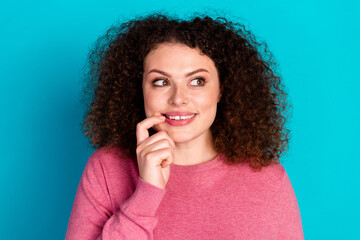 Photo of pretty young woman look empty space wear pink pullover isolated on teal color background